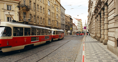 A street in Prague.  Those trains go flying by down the middle of the street all the time.  (2003)