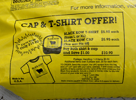 Don't be the last one on your block, err... farm to be wearing the latest in high fashion: The Black Kow commemorative t-shirt and matching cap. (2006)
