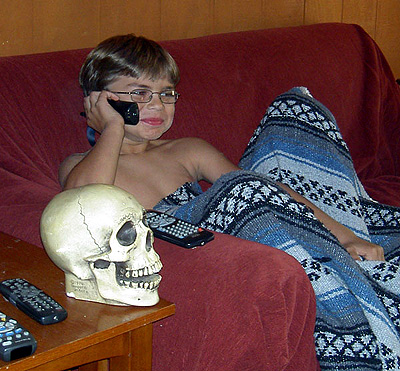 Instead of going to the park, Alex decided to spend some time together with Herman in front of the boob tube.  BTW, Alex is talking to his Uncle Peter on the phone.  (October 2006)