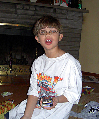 The look of surprise when Alex opened up his new digital camera from Uncle Peter.  (2007)