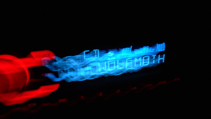 Pretty cool photo.  No digital effects.  Just me moving the camera around inside the car in the dark with the shutter open and pointed at the digital display of my car CD player.  (2007)