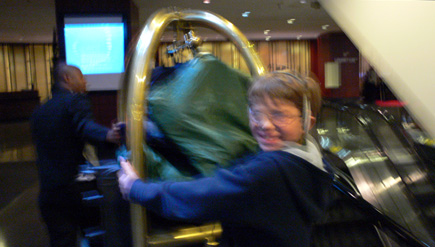 Nephew Alex riding with the luggage Thursday morning when we were checking out of the Westin Peachtree.