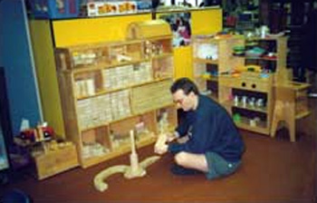 Yeah, that's me.  On my honeymoon in Alaska.  At Valley Park Elementary in Ketchikan playing with the same wooden blocks I did when I was five years old. (1999)