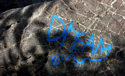 Inspirational graffiti found on a rock near Cook Inlet in Anchorage, Alaska.  (2007)