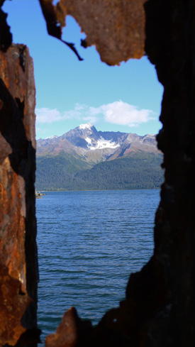 Picture taken through hole in rusted part of dock in Seward, Alaska.  Near the Sea Life Center.  (2007)