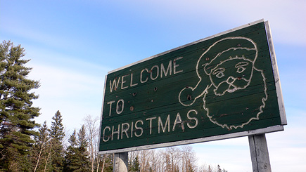 The bullet-hole-pocked sign you'll see as you come into the little town of Christmas, Michigan in the Upper Peninsula of Michigan.  (2007)