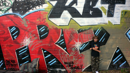 Alex in front of another Gaines Street mural.  (2008)