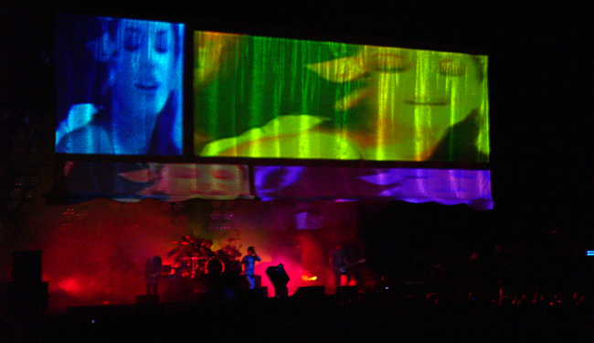 Jane's Addiction performing under a backlit animated screen in Tampa on May 9th, 2009.  (2009)